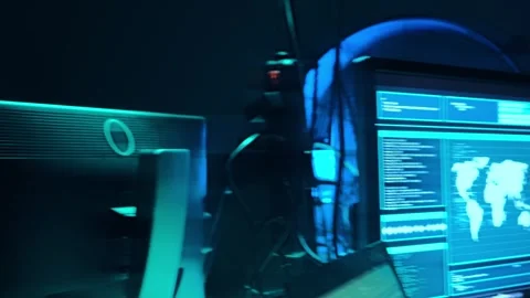 Wanted hackers coding virus ransomware using laptops and computers in the Stock Footage 304491389
