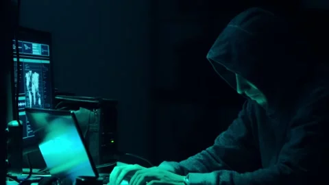 Wanted hackers coding virus ransomware using laptops and computers in the Stock Footage 304491924