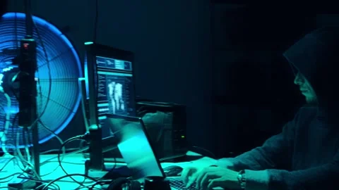 Wanted hackers coding virus ransomware using laptops and computers in the Stock Footage 304580853