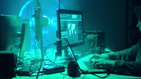 Wanted hackers coding virus ransomware using laptops and computers in the Stock Footage 304581152