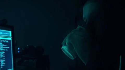 Wanted hackers coding virus ransomware using laptops and computers in the Stock Footage 304581642