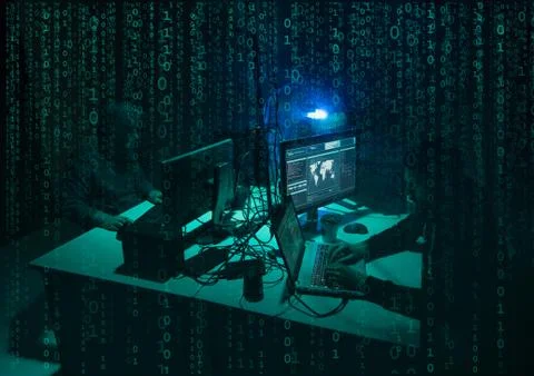 Wanted hackers coding virus ransomware using laptops and computers. Cyber attack 写真素材