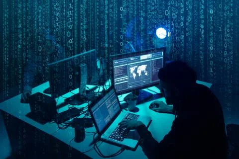 Wanted hackers coding virus ransomware using laptops and computers. Cyber attack 写真素材