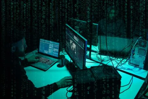 Wanted hackers coding virus ransomware using laptops and computers. Cyber attack 写真素材