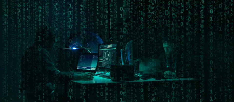 Wanted hackers coding virus ransomware using laptops and computers. Cyber attack 库存照片