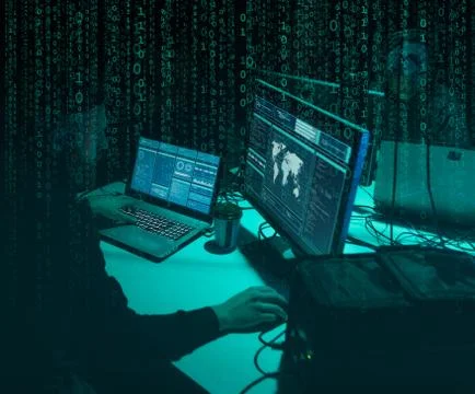 Wanted hackers coding virus ransomware using laptops and computers. Cyber attack 写真素材