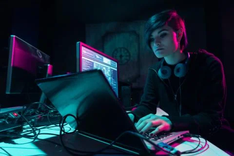 Wanted hackers coding virus ransomware using laptops and computers in the 스톡 사진