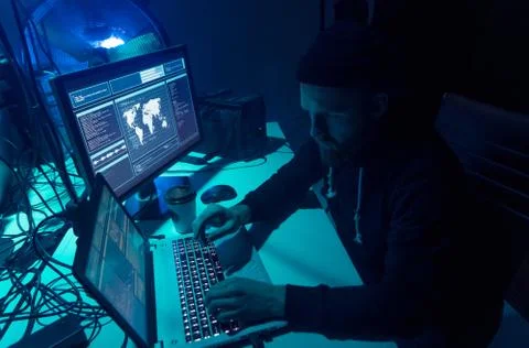 Wanted hackers coding virus ransomware using laptops and computers. Cyber attack 스톡 사진