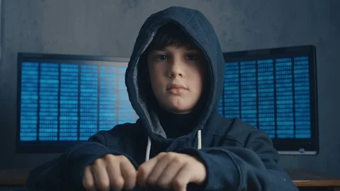 Wanted Prodigy Boy Hacker in the data center filled with display screens Vidéo 102079159