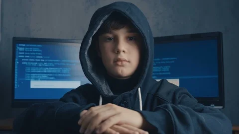 Wanted Prodigy Boy Hacker in the data center filled with display screens Vidéo 102754437