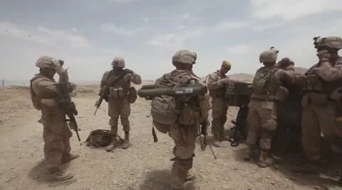 War in Afghanistan - U.S. Marines discuss combat operation Stock Footage