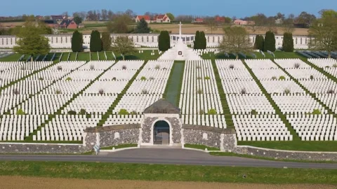 War cemetery tyne cot aerial panorama aligned rows white wwi gravestones Stock Footage 341739909