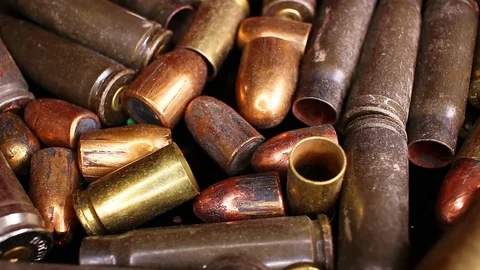 War crime concept gun bullets rotating texture. Stock Footage 96548818