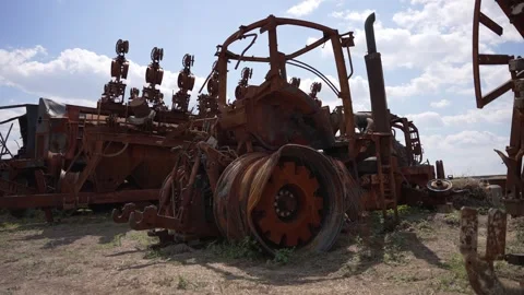 War-Destroyed Farm Machinery in Eastern Ukraine. Concept War Aftermath Stock Footage 263825594