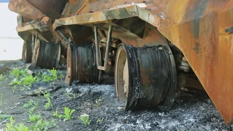 War devastation in Ukraine from destroyed armored vehicles and unexploded shells Stockbeeldmateriaal 329972764