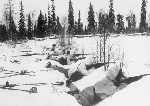 The War in Finland, 1940 A Finnish ski patrol, lying in the snow on the ou... Stock Photos