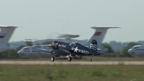 War II carrier-based fighter Chance F4U Corsair accelerates and takes off. Stock Footage 115012724