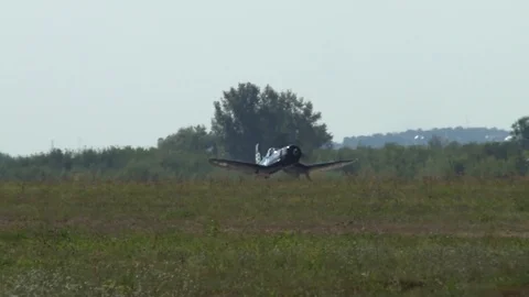 War II carrier-based fighter Chance Vought F4U Corsair runs on runway. Stock Footage 115012747