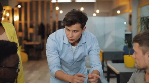 War In office. Two teams compete with each other in a modern office Stock Footage 120768689