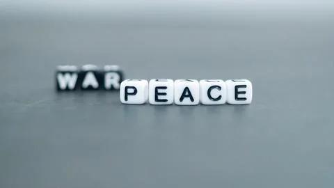 War Peace words in bead block letters. War and peace concept Stock Photos
