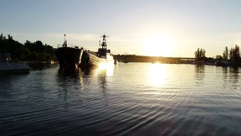 War ship on the sunset river Stock Footage 103426749