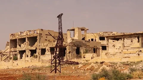 War torn Aleppo ruins with destroyed buildings and broken power lines Stock Footage 317365126