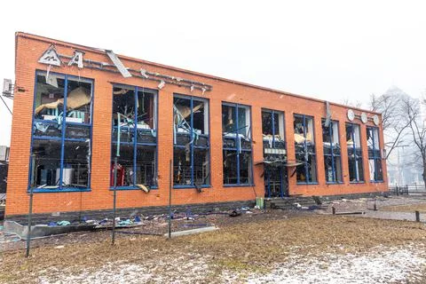 War in Ukraine. Auto parts store damaged by Russian rocket Stock Photos