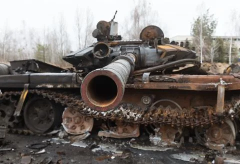 War in Ukraine. Burnt military equipment in Hostomil Stock Photos
