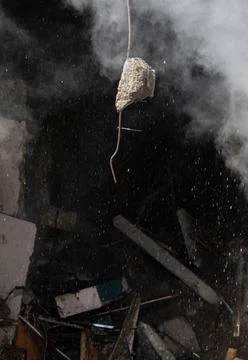 War in Ukraine. Damaged residential building in Kyiv Stock Photos