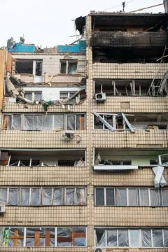 War in Ukraine. Damaged residential building Stock Photos