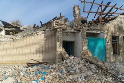 War in Ukraine. School damaged after shelling Stock Photos