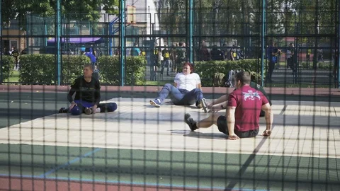 War veterans play sit-down volleyball. Soldiers with prosthetic legs compete. 스톡 동영상 121560050