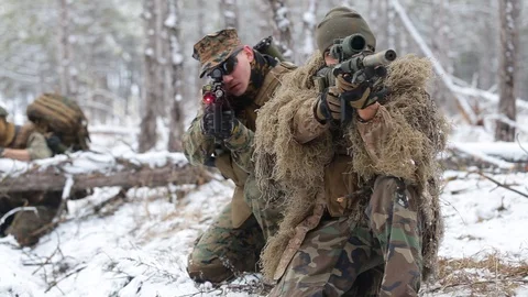 The War Zone. in shootout a soldier was wounded, the other tries to help him. Stock Footage 127957053