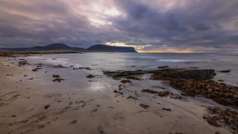 Warbeth beach time lapse with Hoy hills in the distance in Orkney 4k Video stock 288014978