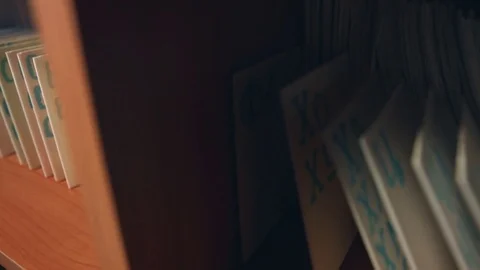 Wardrobe with a card file. Horizontal pan. Close-up. Видео 70966706
