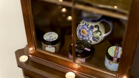 Wardrobe with cosmetics for a spa. Reflection on glass Stock Footage 83414467