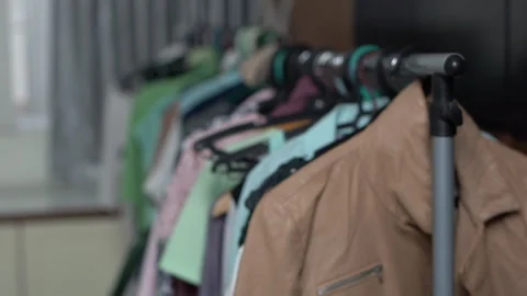 Wardrobe with the hanging cloths Video stock 153874407