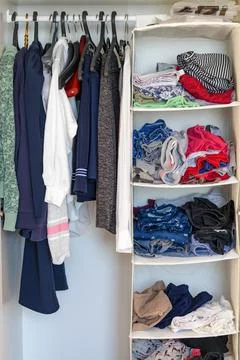 A wardrobe. Shelf clothes. Stock Photos