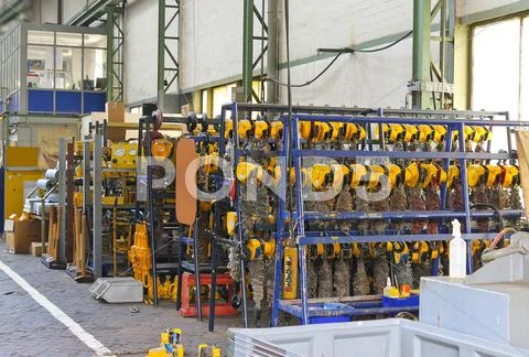 In a warehouse of accessories and spare parts of the industrial enterprise Stock Photos