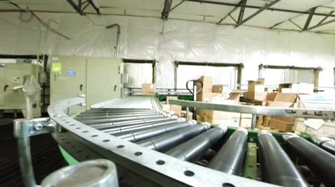 Warehouse boxes. Boxes moving on convener.  Stock Footage 38408778