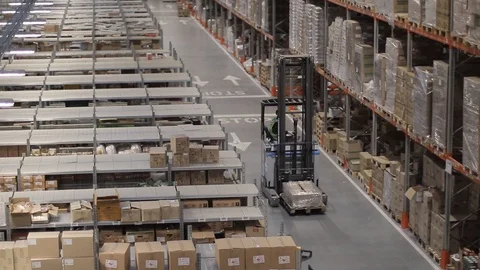 Warehouse with cardboard boxes inside on pallets racks, logistic center. Vídeos de archivo 126269002
