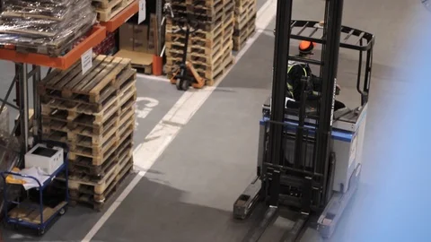 Warehouse with cardboard boxes inside on pallets racks, logistic center. 動画素材 126269029