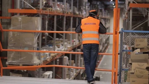 Warehouse with cardboard boxes inside on pallets racks, logistic center. Vídeos de archivo 126269197