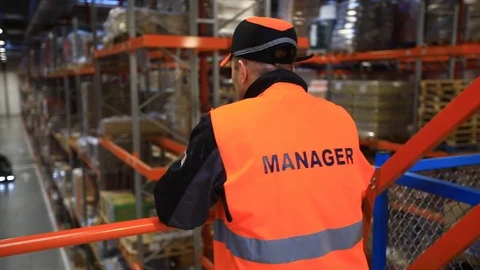 Warehouse with cardboard boxes inside on pallets racks, logistic center. Vídeos de archivo 126269395