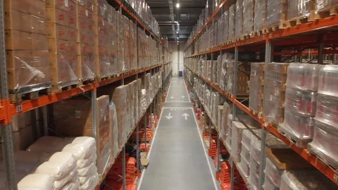 Warehouse with cardboard boxes inside on pallets racks, logistic center. Vídeos de archivo 126269672