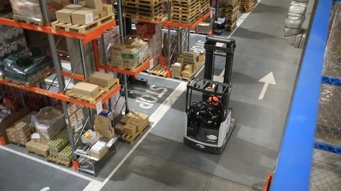 Warehouse with cardboard boxes inside on pallets racks, logistic center. 库存影片 126269762