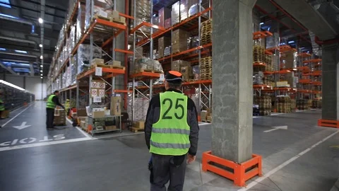 Warehouse with cardboard boxes inside on pallets racks, logistic center. Stock-Footage 126269809