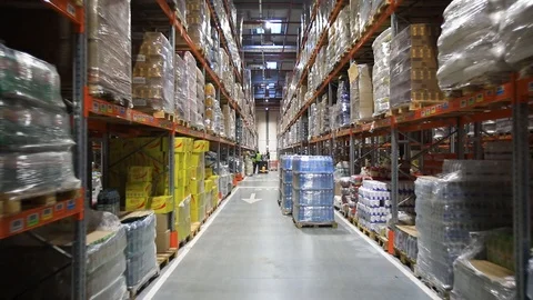Warehouse with cardboard boxes inside on pallets racks, logistic center. Stock Footage 126269849