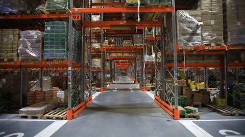 Warehouse with cardboard boxes inside on pallets racks, logistic center. Stock Footage 126269892
