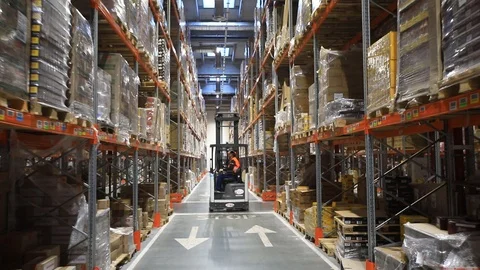 Warehouse with cardboard boxes inside on pallets racks, logistic center. 스톡 동영상 126270032
